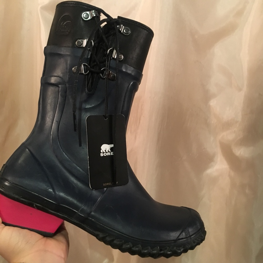 Sorel waterproof rain boots with hot pink heels